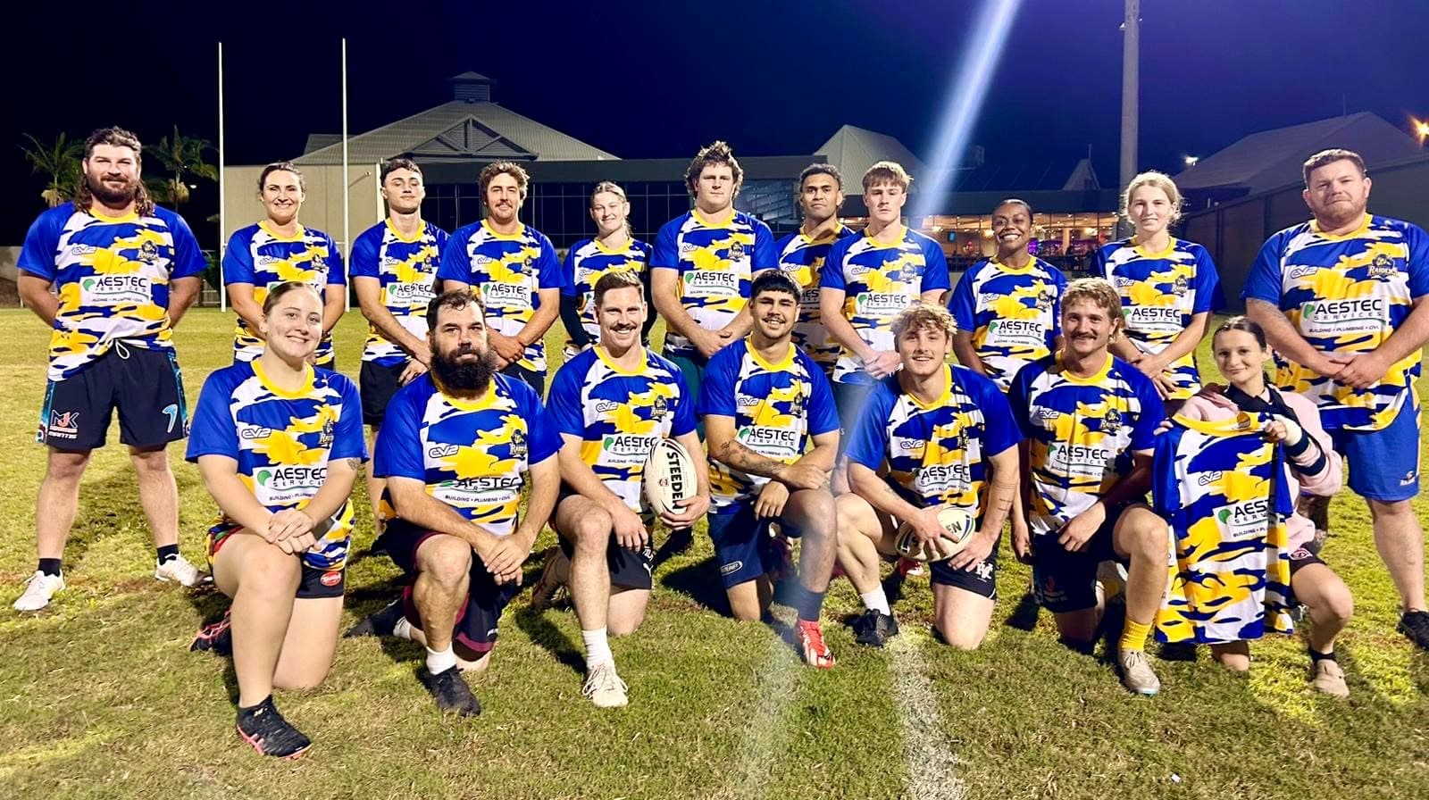 Gladstone representative rugby league players in blue and yellow jerseys