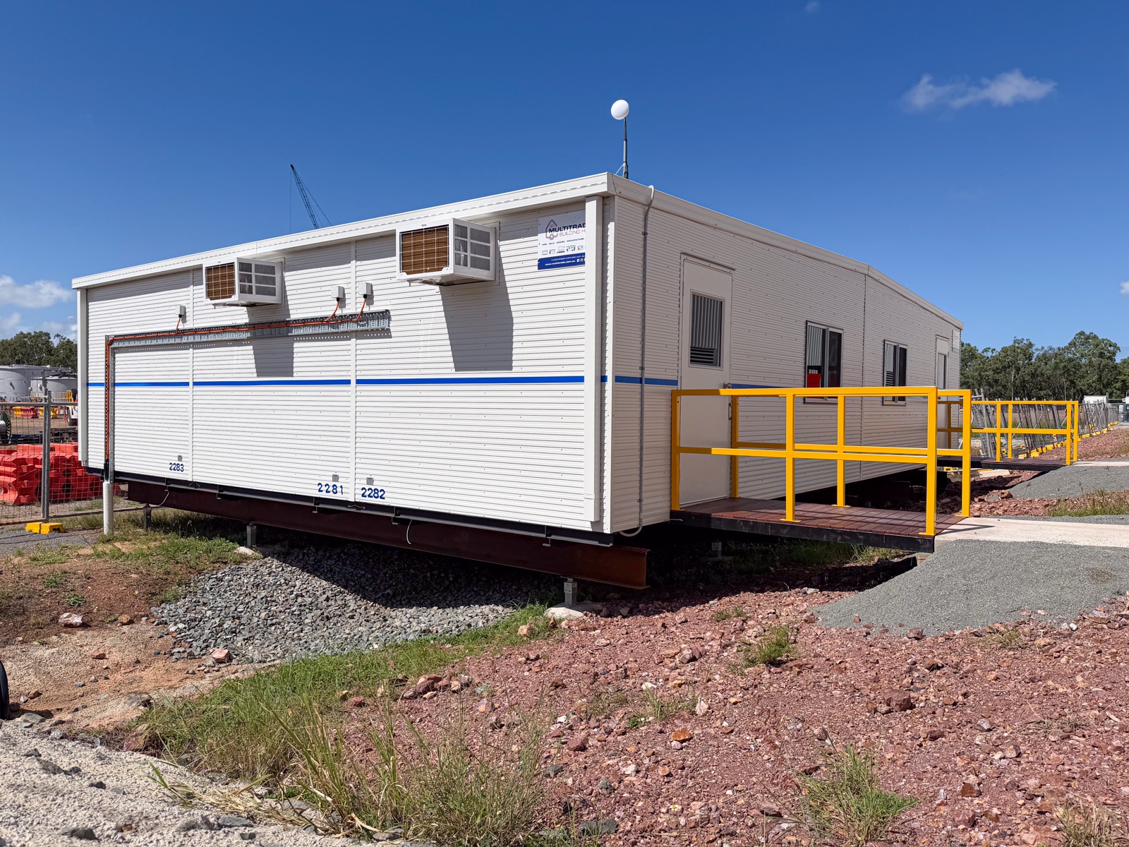 12×9m office complex at Alpha HPA Yarwun — front elevation with dual entry ramps