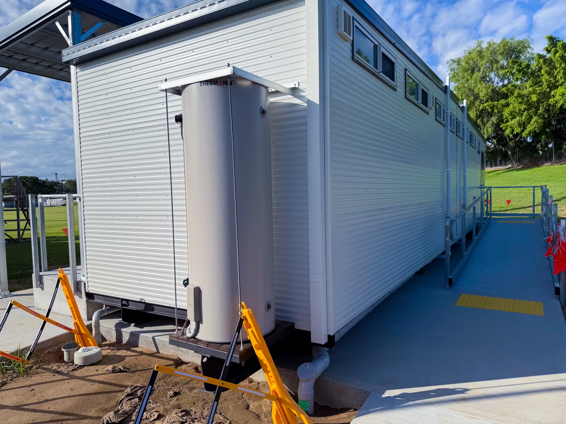 End view showing hot water system and covered area