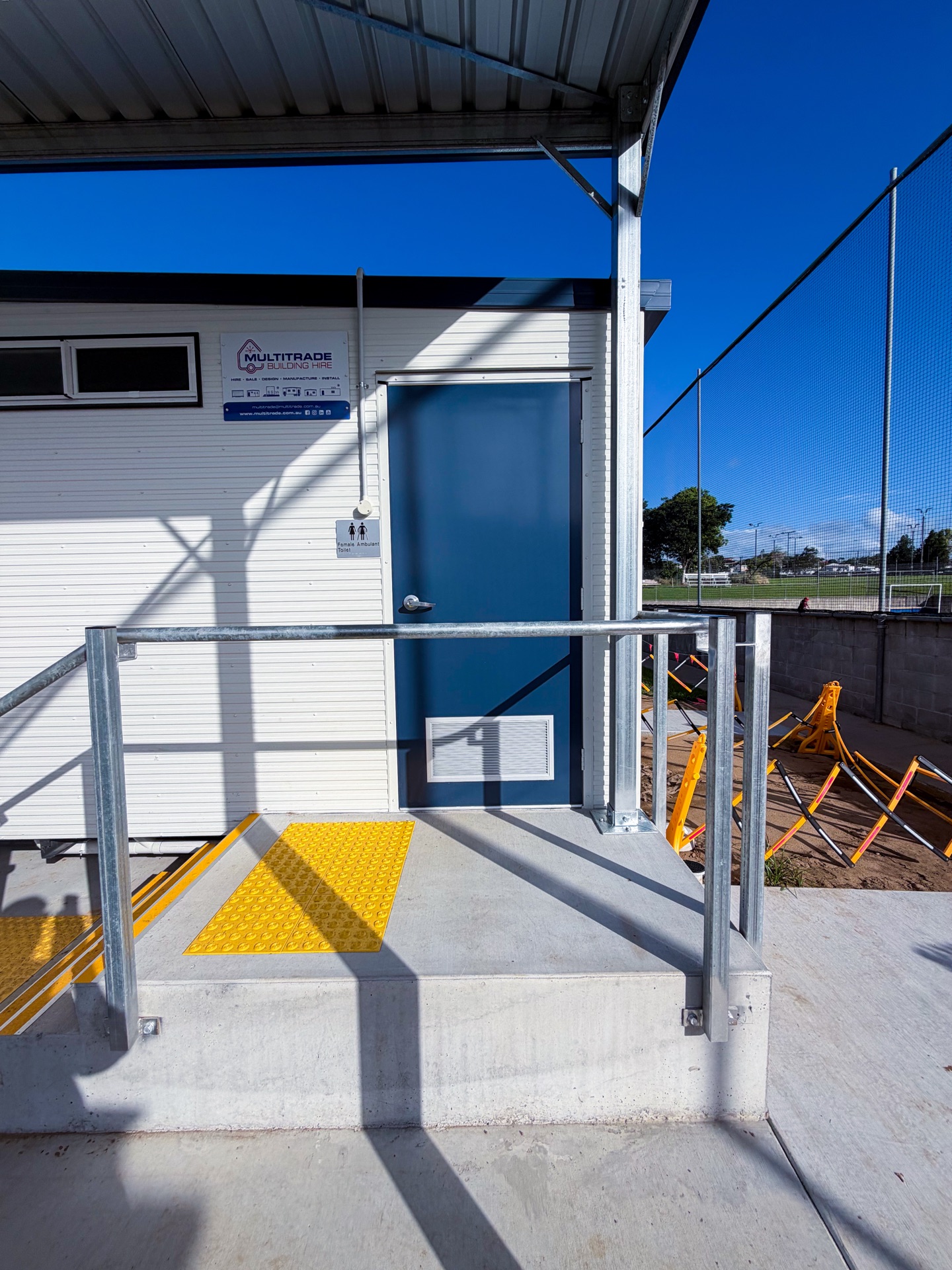 PWD-compliant entry with Multitrade signage
