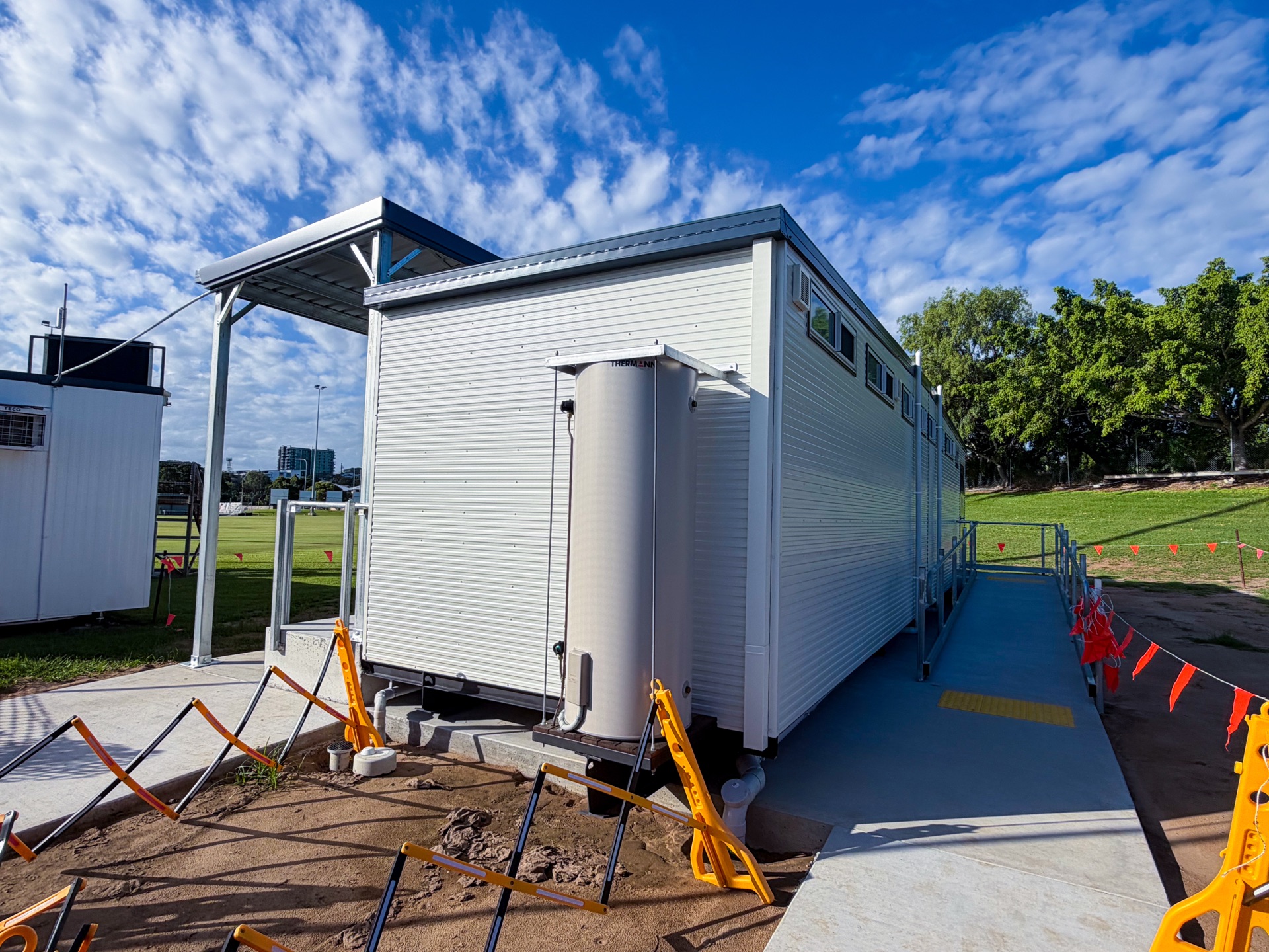 Rear view with 315L hot water system and ramp