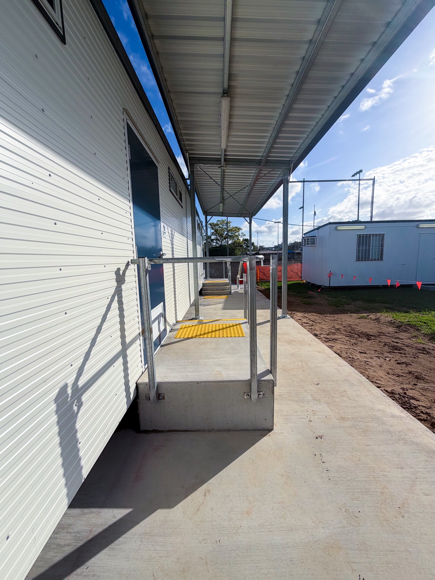 PWD ramp and walkway with tactile indicators